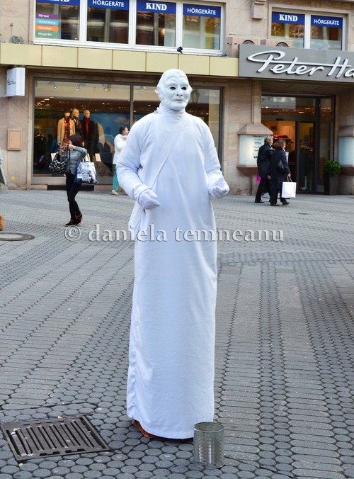 Product picture human white statue, man acting like a statue, Germany