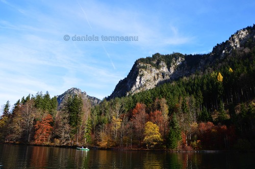 Product picture with the boat on lake Alpsee, autumn colours, Bavaria, Germa